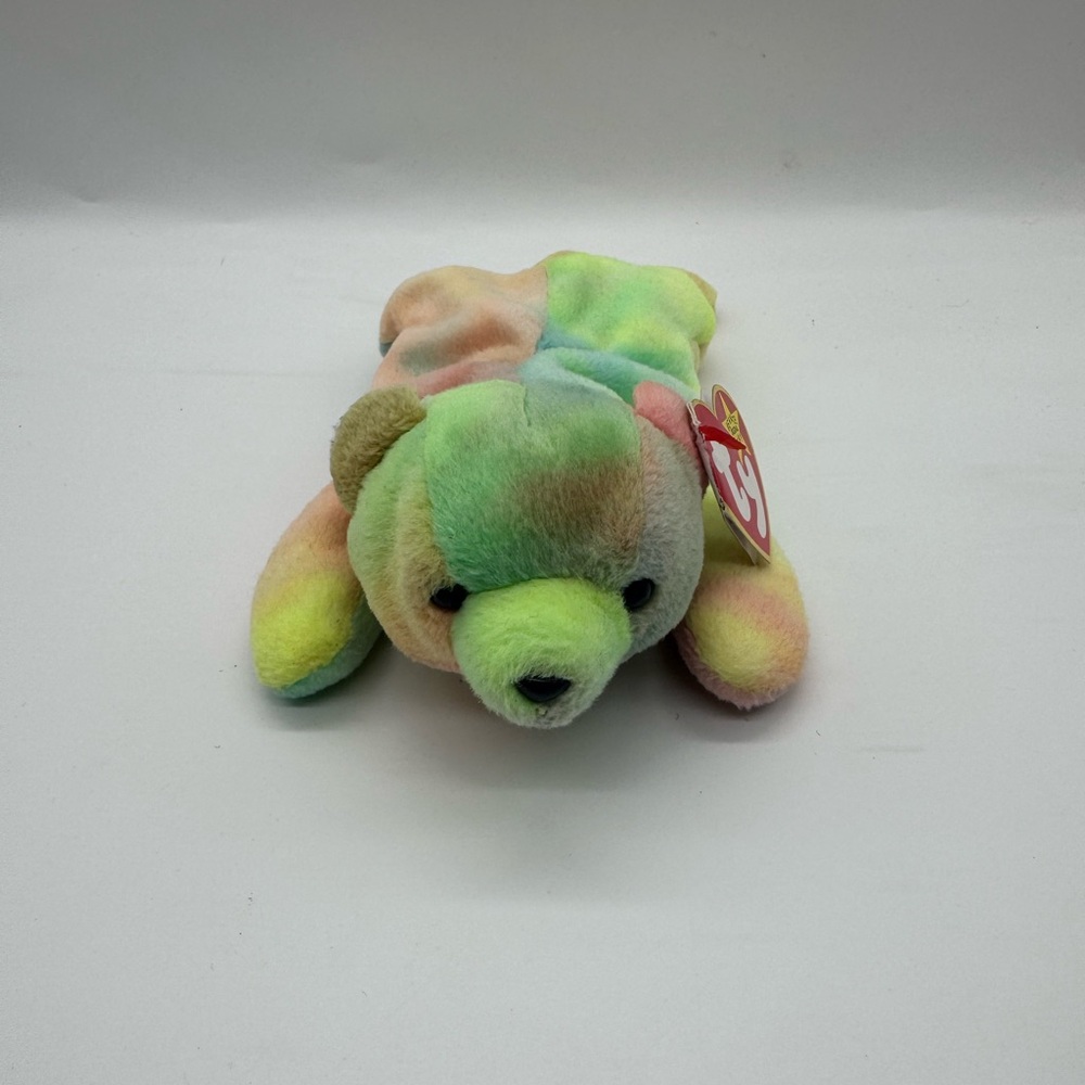 Sammy the Bear Ty Beanie Baby, a rainbow tie-dye plush teddy bear.